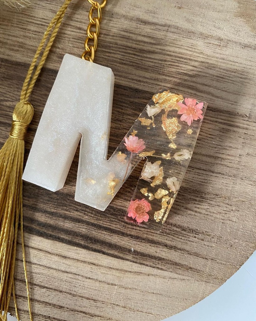 Porte clé M rose