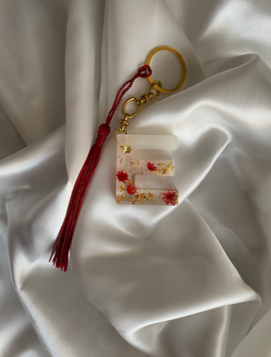 Porte clé doré rouge