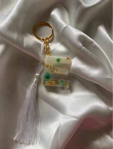 Porte clé doré bleu
